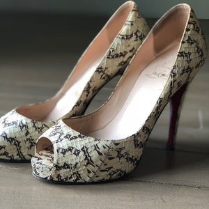 snakeskin Louboutin peep-toe pumps
